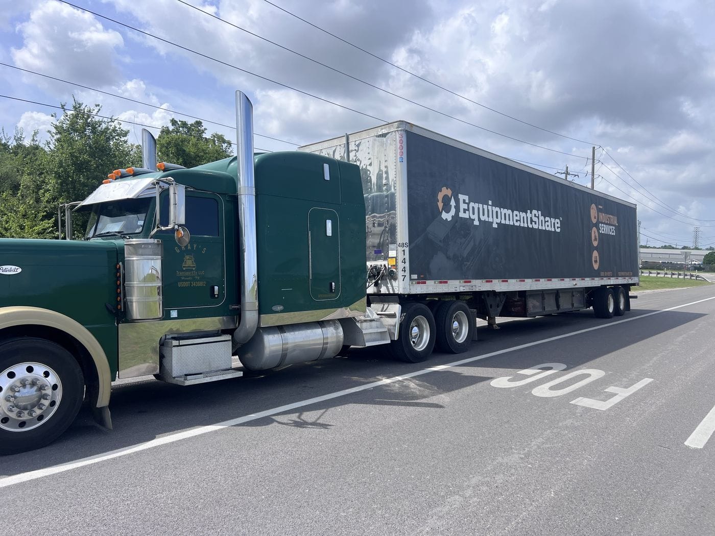 Semi-truck and trailer on the highway