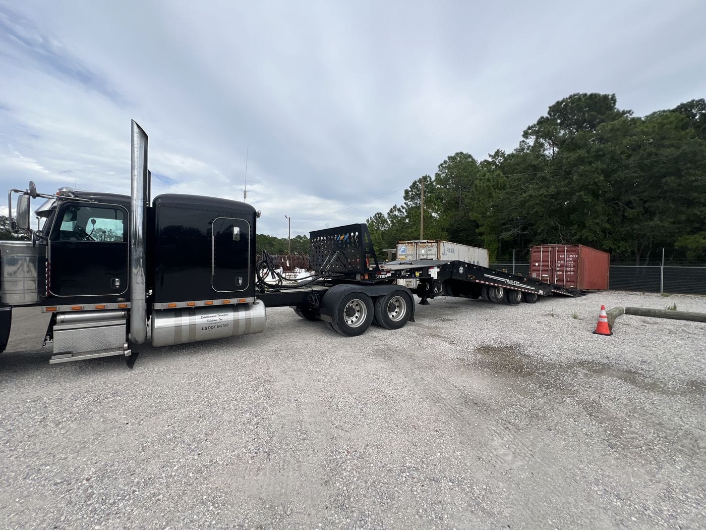 Flatbed trailer parked roadside